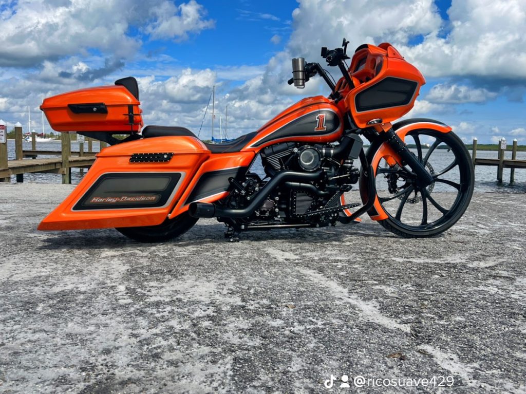 Touring motorcycle parked on a waterfront pier