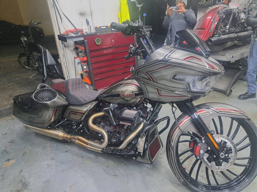 Black and chrome custom motorcycle with red pinstriping